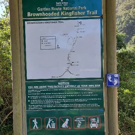 Trailhead information board for the Brown-hooded Kingfisher route.